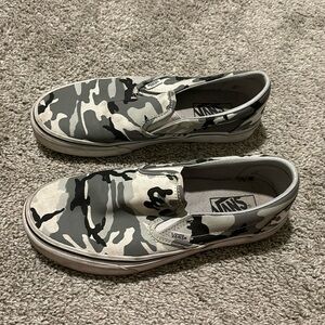 Grey, white, and black camouflage vans. Women’s size 8.5, men’s size 7
